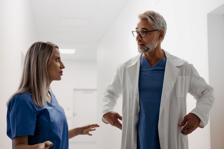 A nurse complains to a physician about one of her colleagues, an example of the "communication triangle" that facilities should avoid.