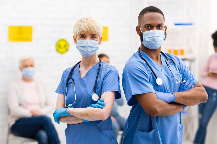Nurses participating in a group mentoring session.