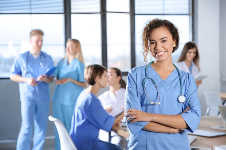 A group of nurses in a room.