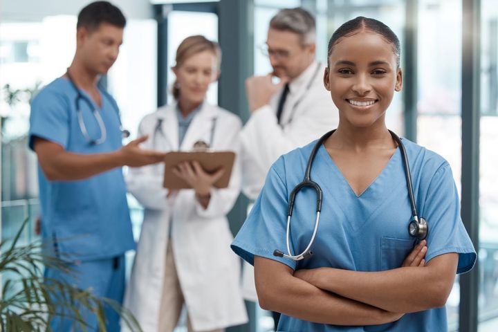 Nurse manager in a medical facility smiling for the camera