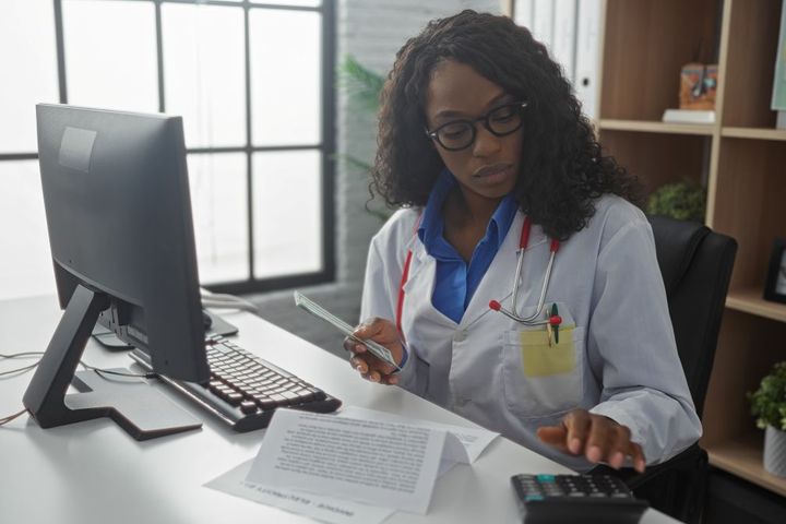 A patient care coordinator looks up information for a patient.