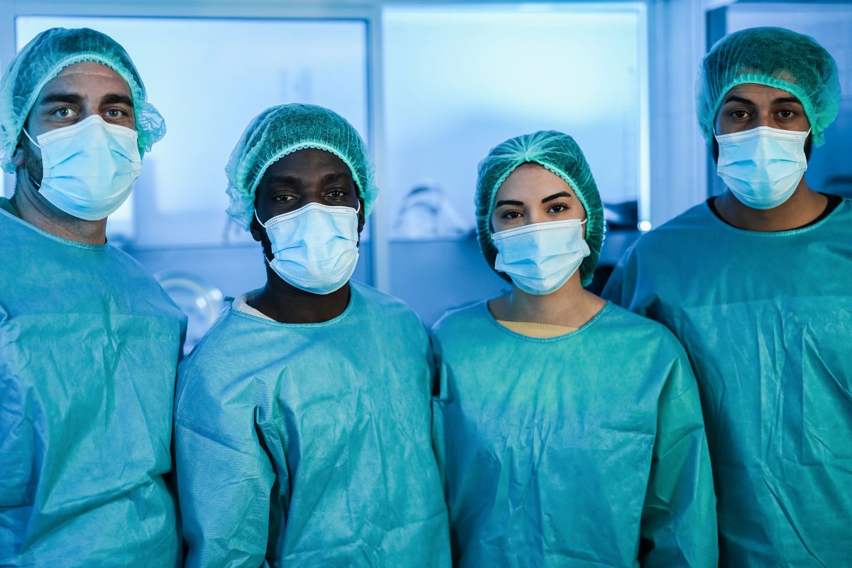 Staff at an ambulatory surgery center look at the camera.