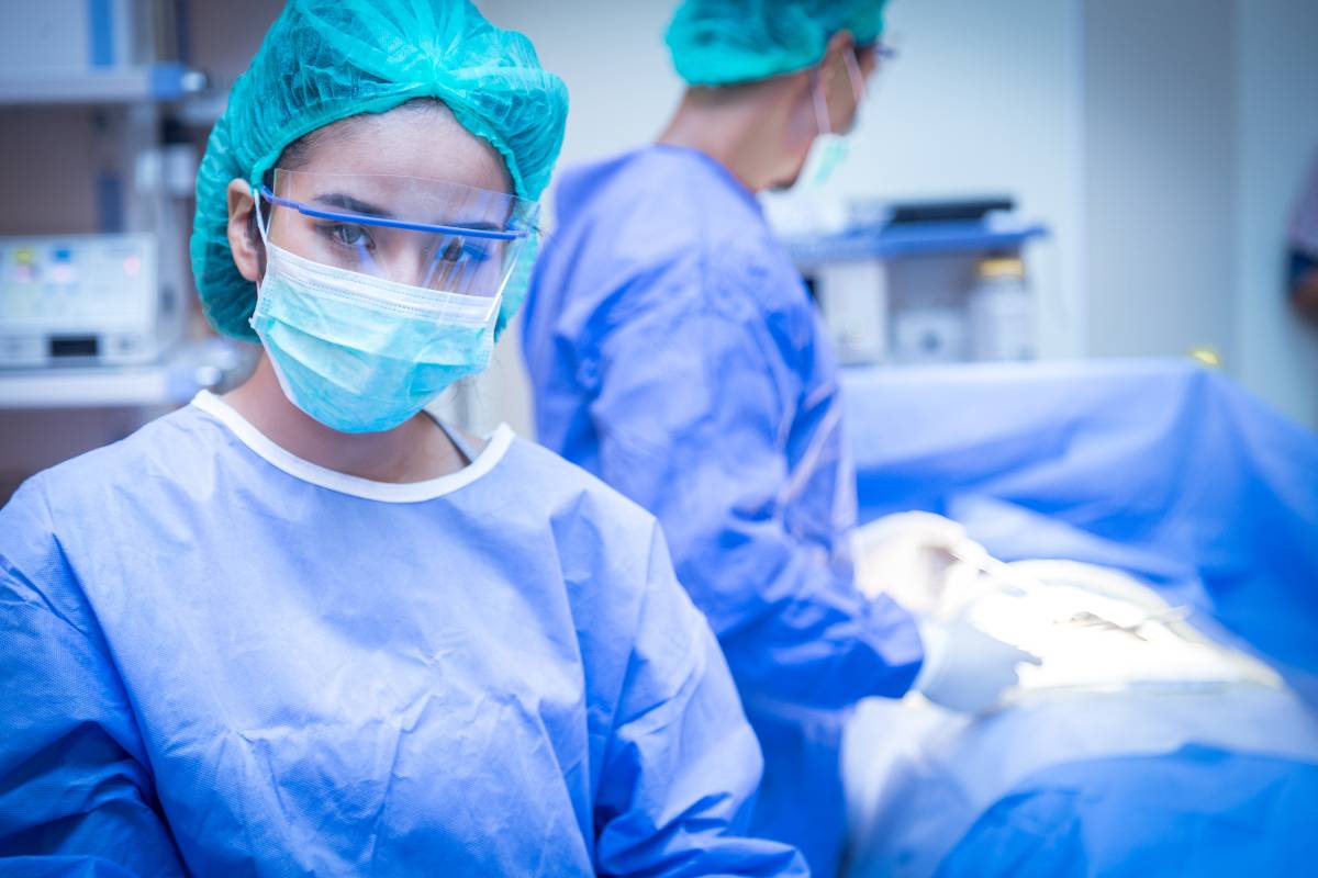 A nurse demonstrates circulating nurse resume skills in the surgical suite.