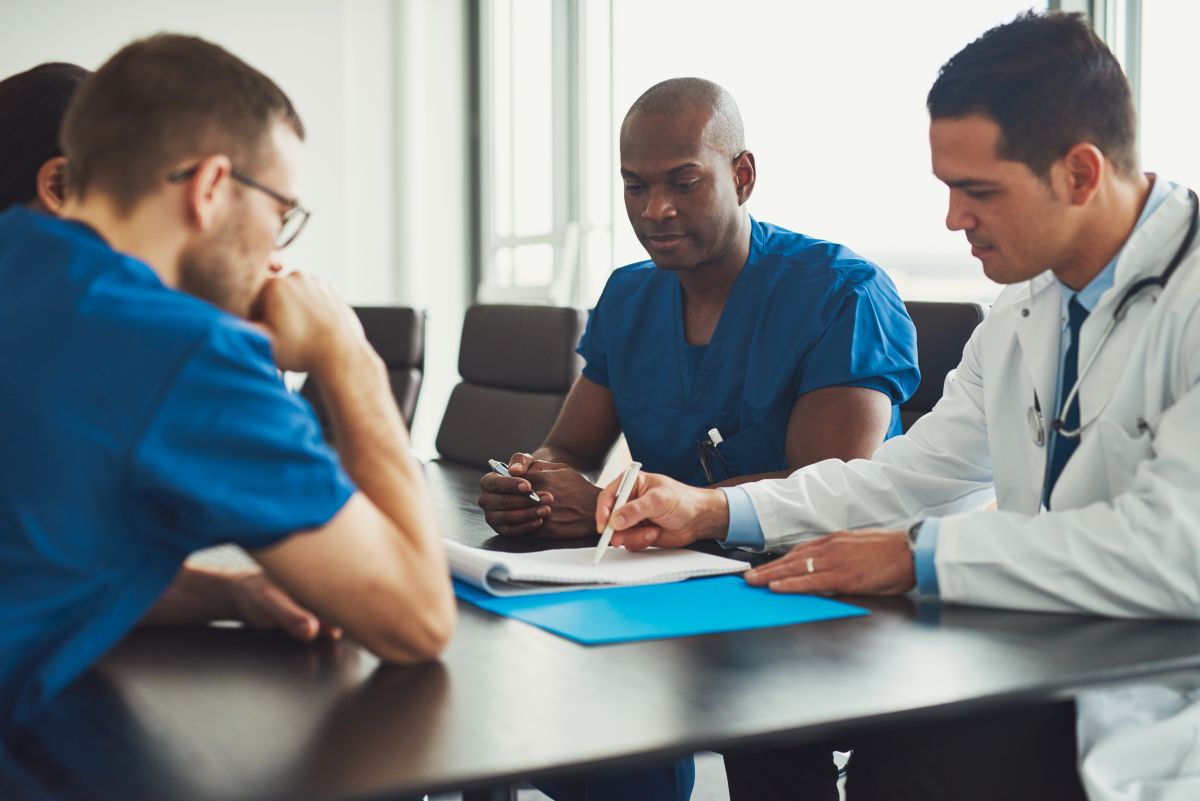 Nurses work out their nursing goals for yearly evaluation.