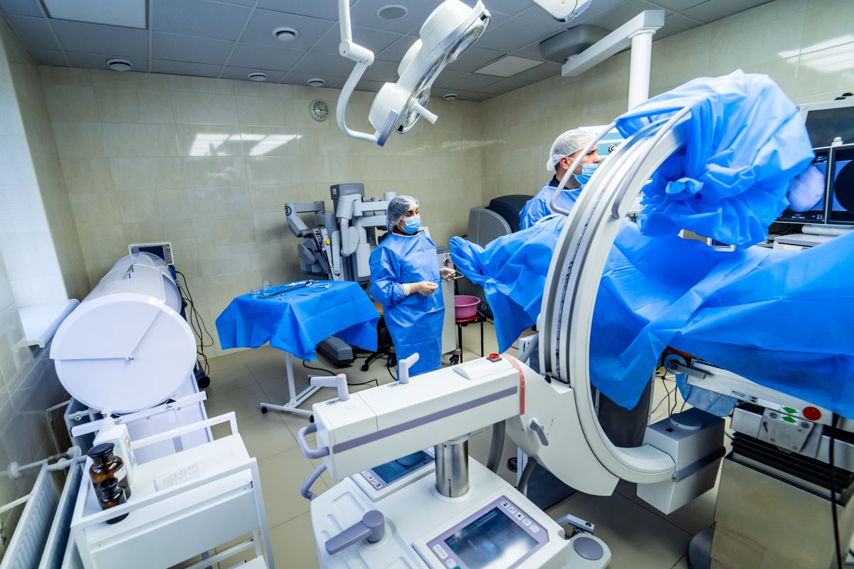 Hospital staff prepare a patient for a surgical procedure.
