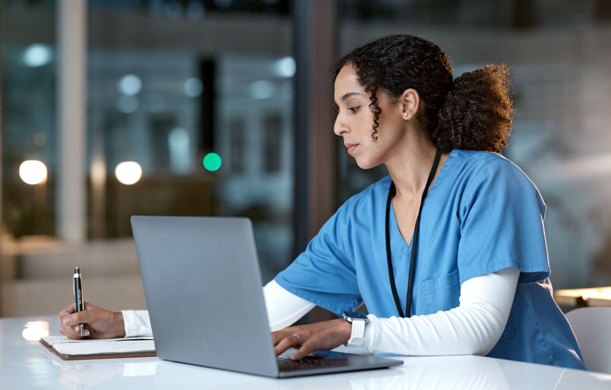 Woman working on a computer in an office
