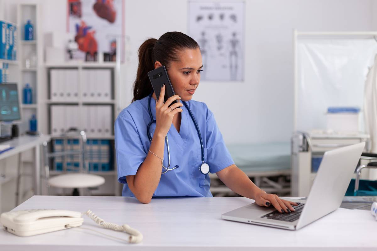 A healthcare professional researches how to become an RN in Massachusetts.