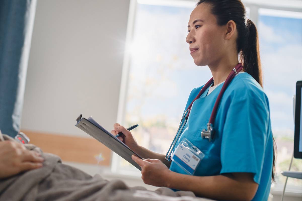 A nurse works on her MN nursing license renewal process.