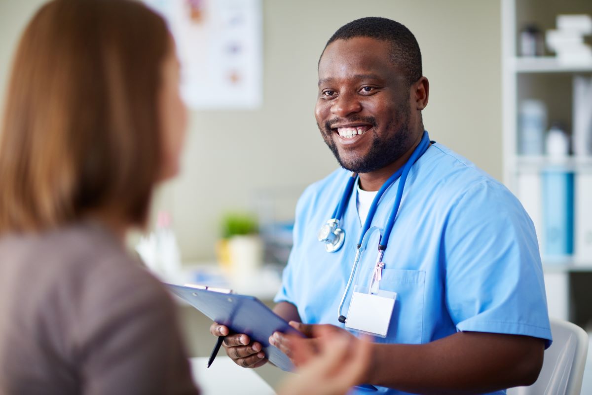 Nurse with stethoscope and pen