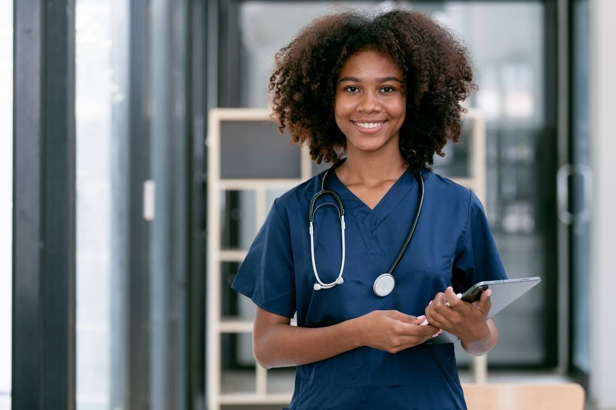 A nurse uses her nursing supplies at work.