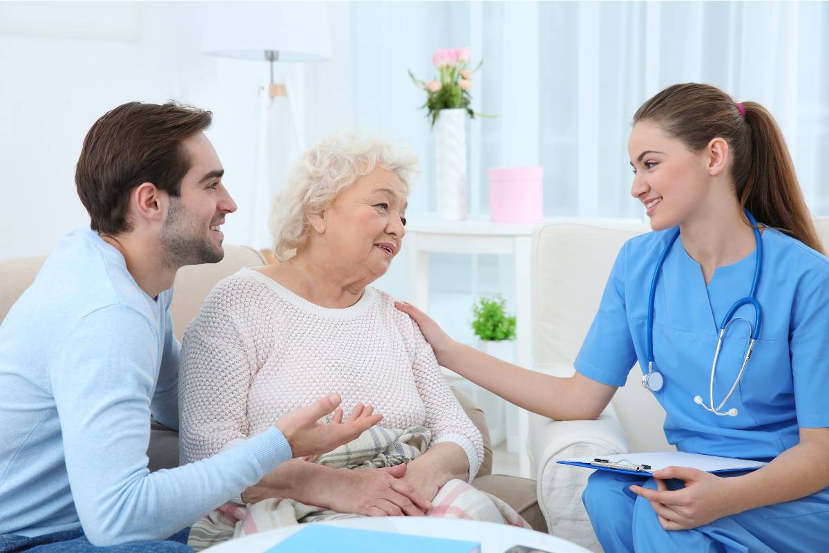 A nurse explains to a patient what the facility's patient bill of rights states.