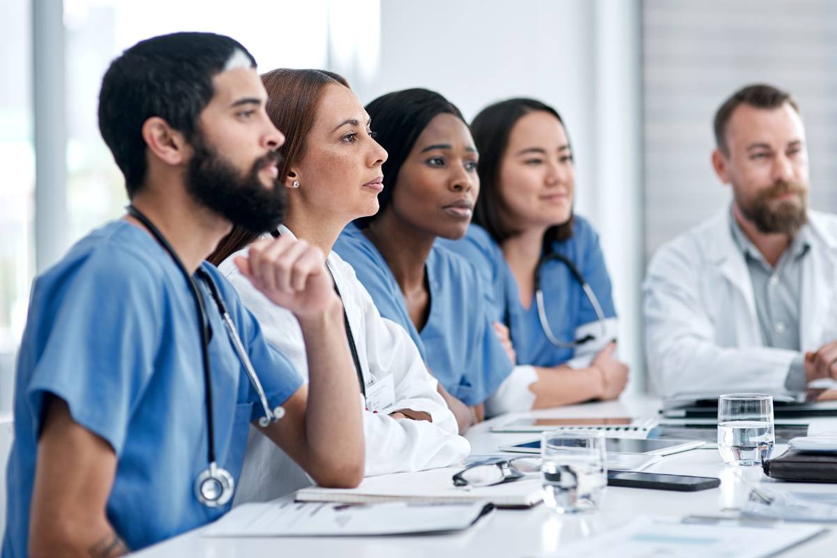 A group of healthcare workers demonstrate professionalism in nursing.
