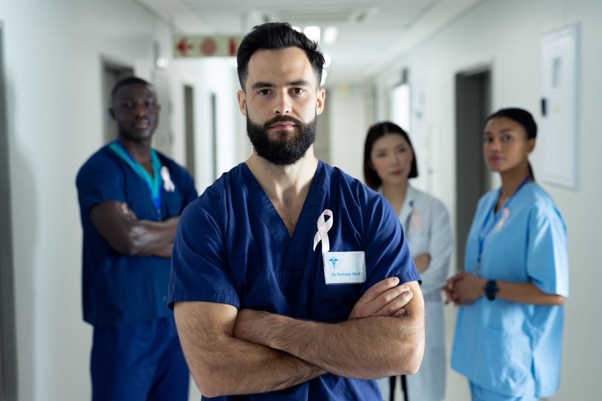 Nurses in the hallway of a hospital.