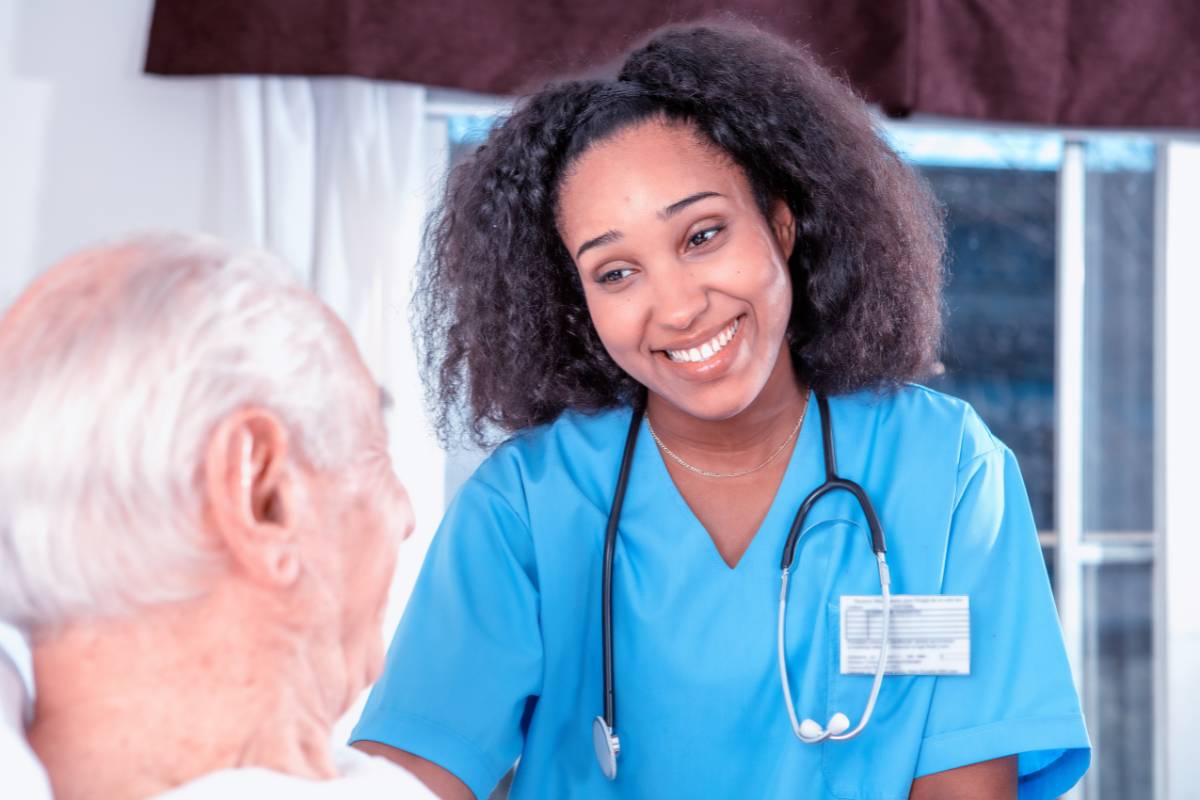 A urology nurse practitioner meets with a patient to discuss their treatment plan.